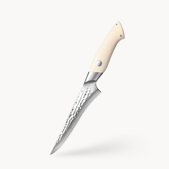 6-inch fillet knife in Damascus steel with an ivory-coloured G10 handle
